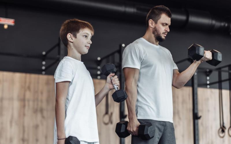A father and son training together